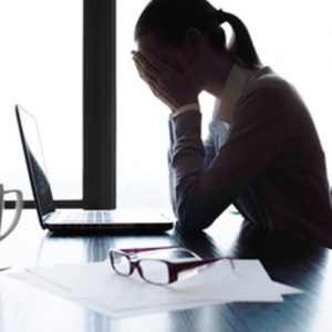 Workplace Stress - Office Worker Dealing with Stress