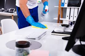 Man Cleaning Desk